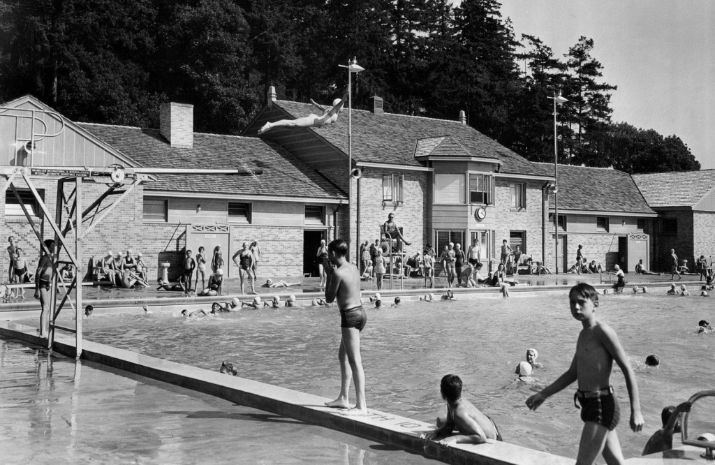 Seattle Swimmers have a choice of outdoor or indoor pools, fresh or salt water beaches all summer long. This scene is at popular Colman Pool. ( / )