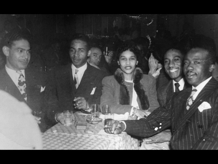 Charlie Parker and other patrons at Shepps' Playhouse, a Bronzeville nightclub.