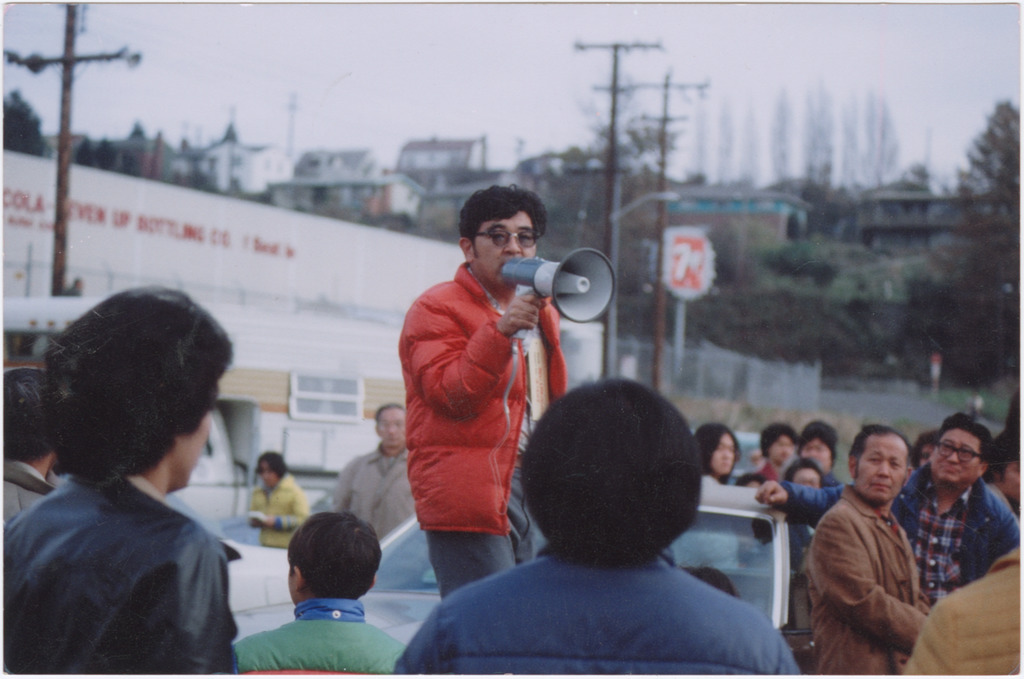 Japanese American Organizer speaking to a large crowd